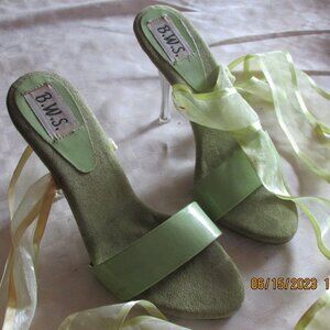 Sexy heels with satin ribbons hugging your leg, light lime green